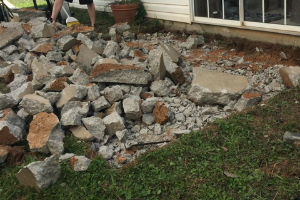 Removing the patio to build a platform deck